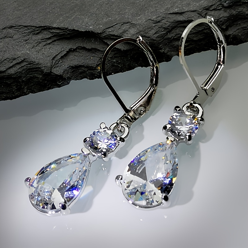 Longues boucles d'oreilles de luxe en zircone scintillante en forme de goutte - Élégantes boucles d'oreilles de charme et de tempérament
Longues boucles d'oreilles de luxe en zircone scintillante en forme de goutte - Élégantes boucles d'oreilles de charme et de tempérament