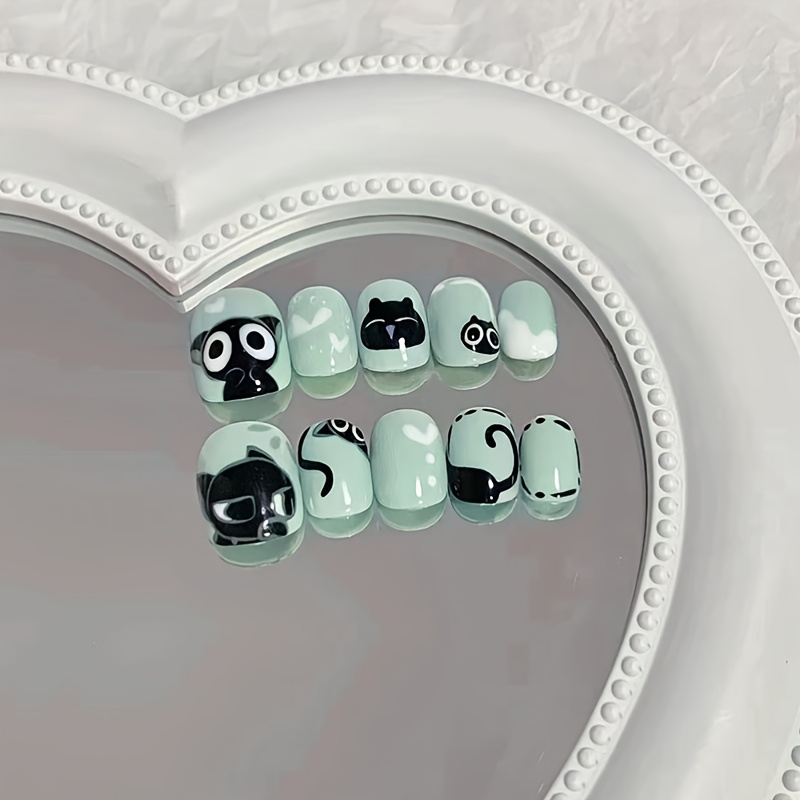 Cartoon Fresh Green Base Short Oval False Nails Cute Little Black Cat Pattern Fake Nails Removable Fake Nails Wearable Nails
Cartoon Fresh Green Base Short Oval False Nails Cute Little Black Cat Pattern Fake Nails Removable Fake Nails Wearable Nails