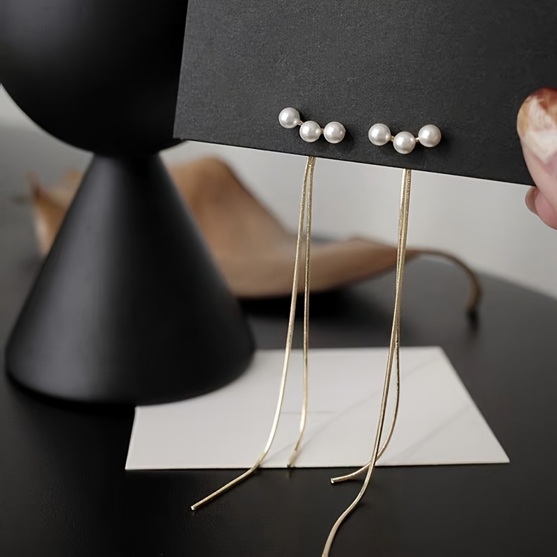 Festival Ready, Elegant & Cute Pearl Tassel Earrings - Long Dangle Design For Women, Vacations & Festivals
Festival Ready, Elegant & Cute Pearl Tassel Earrings - Long Dangle Design For Women, Vacations & Festivals