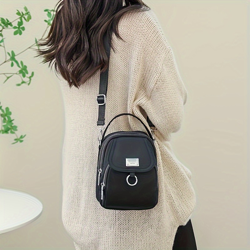 Sac Bandoulière Chic en Nylon pour Femme - Couleur Unie Polyvalente avec Fermeture Éclair, pour le Shopping & l'
Sac Bandoulière Chic en Nylon pour Femme - Couleur Unie Polyvalente avec Fermeture Éclair, pour le Shopping & l'