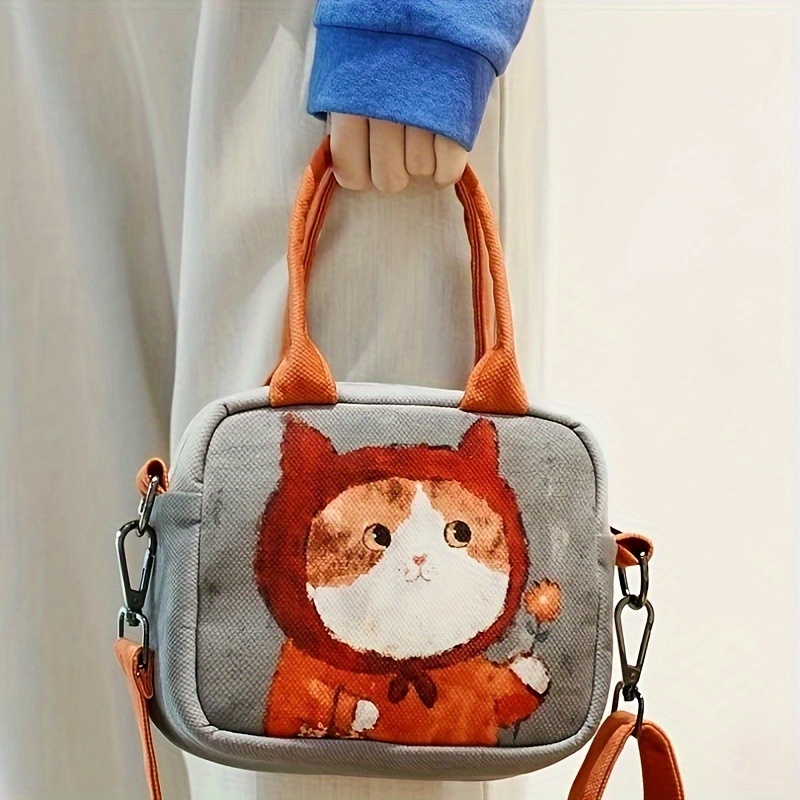 Cartoon Cat Canvas Small Square Shoulder Bag For Women, Crossbody Mobile Phone Pouch, Lightweight Fashionable Portable Purse With Adjustable Strap
Cartoon Cat Canvas Small Square Shoulder Bag For Women, Crossbody Mobile Phone Pouch, Lightweight Fashionable Portable Purse With Adjustable Strap