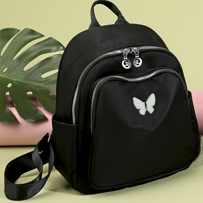 Chic Black Nylon Backpack For Women - Lightweight, & Stylish With Adjustable Straps And Zip Closure
Chic Black Nylon Backpack For Women - Lightweight, & Stylish With Adjustable Straps And Zip Closure
