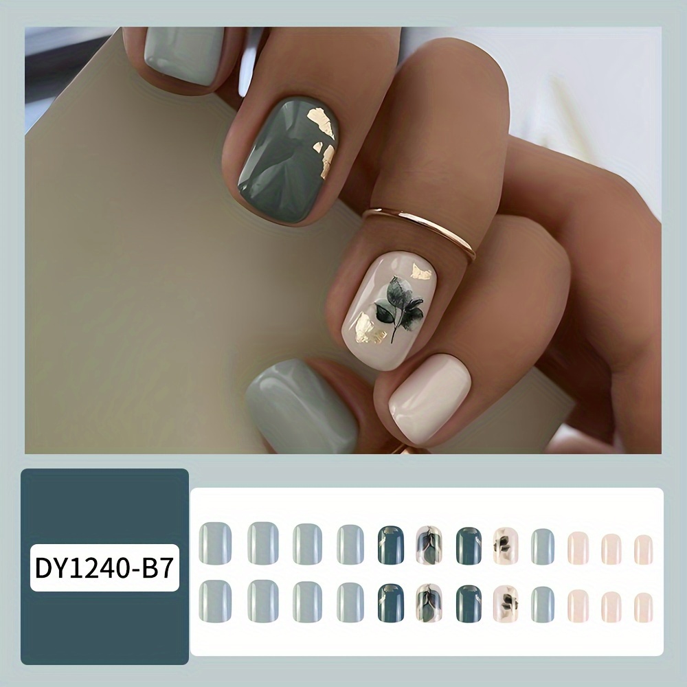 Formes d'ongles carrées courtes ton vert avec motif végétal brillant et design feuille pailletée - Ensemble de 24 pièces
Formes d'ongles carrées courtes ton vert avec motif végétal brillant et design feuille pailletée - Ensemble de 24 pièces