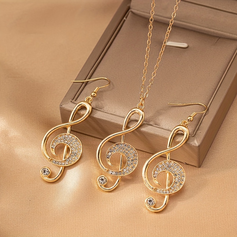 An Elegant Necklace And A Pair Of Earrings Featuring Creative Musical Note Drop Earrings With Rhinestones, Parties And Gatherings.
An Elegant Necklace And A Pair Of Earrings Featuring Creative Musical Note Drop Earrings With Rhinestones, Parties And Gatherings.