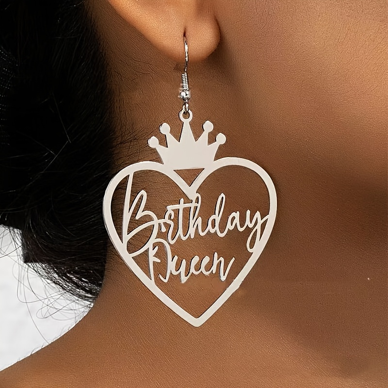 A Pair Of Minimalist Crown Heart Earrings With A High-end , Featuring A Parties And Wear.
A Pair Of Minimalist Crown Heart Earrings With A High-end , Featuring A Parties And Wear.