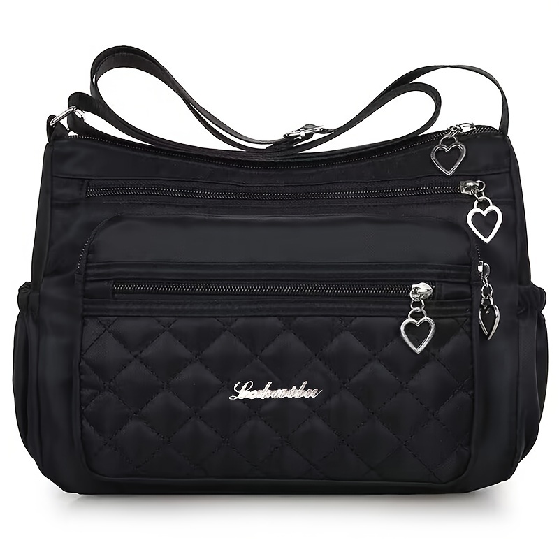 Sac Bandoulière en Nylon Matelassé Noir pour Femmes – Bretelle Réglable, Léger et Élégant avec Charmes Cœur et Pochettes à Fermeture Éclair, Petit Sac Bandoulière
Sac Bandoulière en Nylon Matelassé Noir pour Femmes – Bretelle Réglable, Léger et Élégant avec Charmes Cœur et Pochettes à Fermeture Éclair, Petit Sac Bandoulière