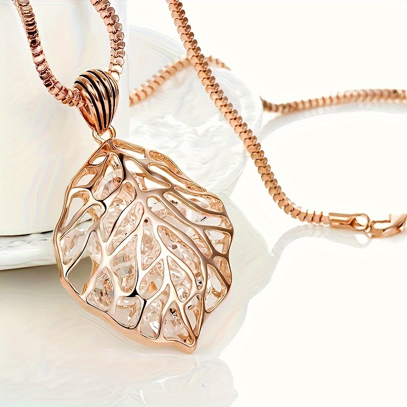 Imitation Crystal Hollow Leaf Pendant Necklace, Fashionable Versatile Personalized Minimalist Long Women's Sweater Chain Elegant Jewelry Accessories
Imitation Crystal Hollow Leaf Pendant Necklace, Fashionable Versatile Personalized Minimalist Long Women's Sweater Chain Elegant Jewelry Accessories
