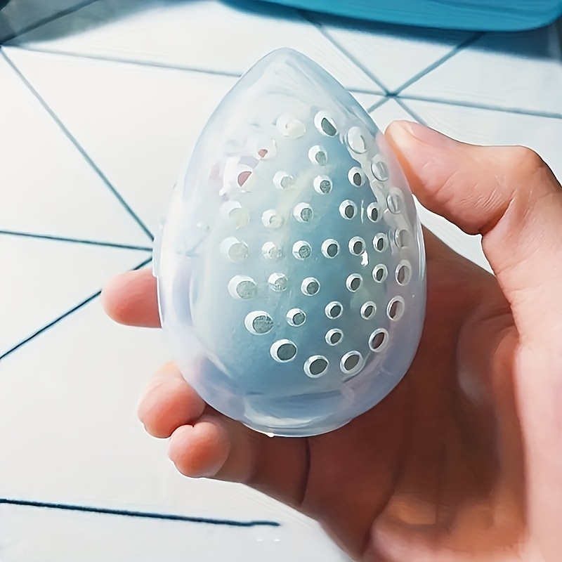 1pc/2pcs Makeup Egg Plastic Storage Box, Egg-shaped Makeup Puff And Sponge Display Rack - Stylish Storage Organizer With Ventilation, Portable Design, To Tools When Traveling, Plastic Structure
1pc/2pcs Makeup Egg Plastic Storage Box, Egg-shaped Makeup Puff And Sponge Display Rack - Stylish Storage Organizer With Ventilation, Portable Design, To Tools When Traveling, Plastic Structure