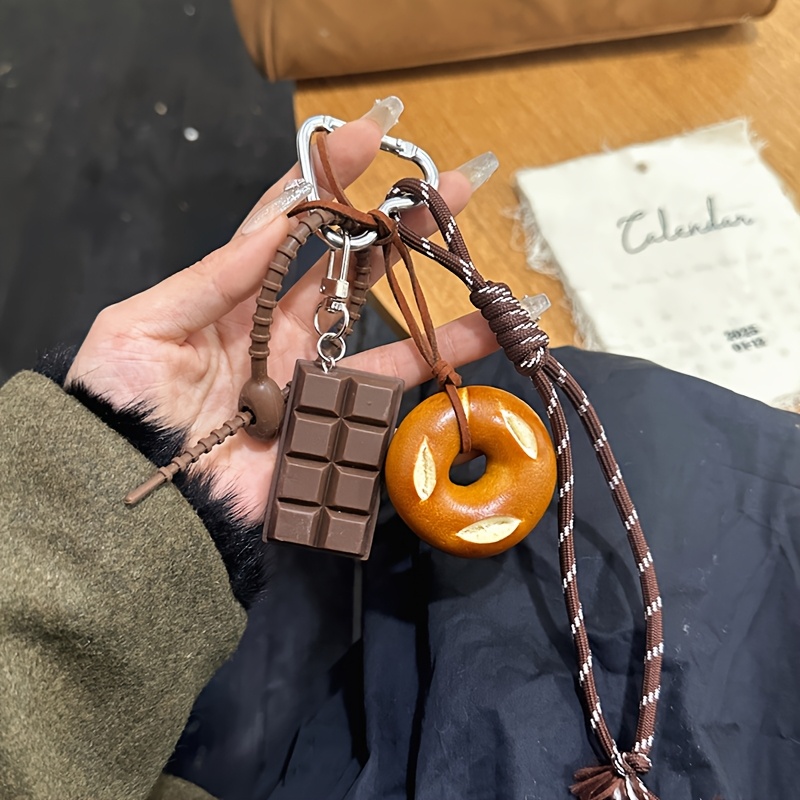 Handmade Water Bagel Bag Pendant, Cute Plastic Bread Charm With Woven Rope, Trendy Handbag Accessory For Hanging
Handmade Water Bagel Bag Pendant, Cute Plastic Bread Charm With Woven Rope, Trendy Handbag Accessory For Hanging