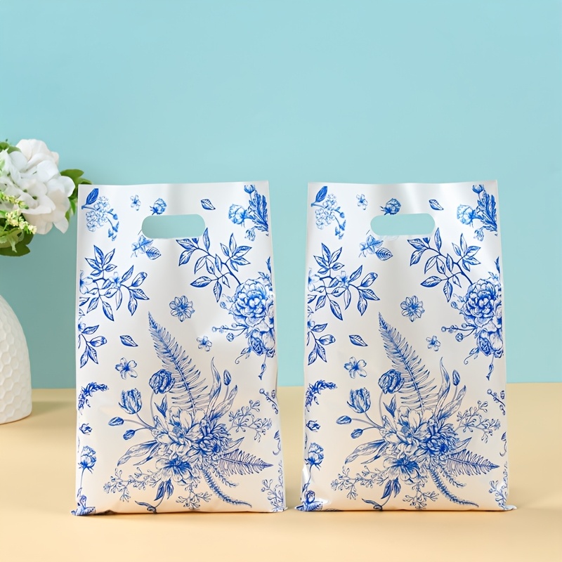 10/25/50pcs Élégantes Sacs Cadeaux Floral Bleu et Blanc, Sacs en Plastique pour Mariage, Baby Shower, Douche Nuptiale, Anniversaire, Célébrations Générales - Sacs d'Emballage Décoratifs
10/25/50pcs Élégantes Sacs Cadeaux Floral Bleu et Blanc, Sacs en Plastique pour Mariage, Baby Shower, Douche Nuptiale, Anniversaire, Célébrations Générales - Sacs d'Emballage Décoratifs
