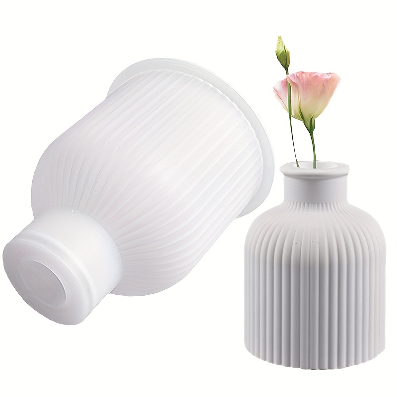 1 moule de vase en silicone DIY, irrégulière, matériau flexible pour la création de vases de fleurs
1 moule de vase en silicone DIY, irrégulière, matériau flexible pour la création de vases de fleurs