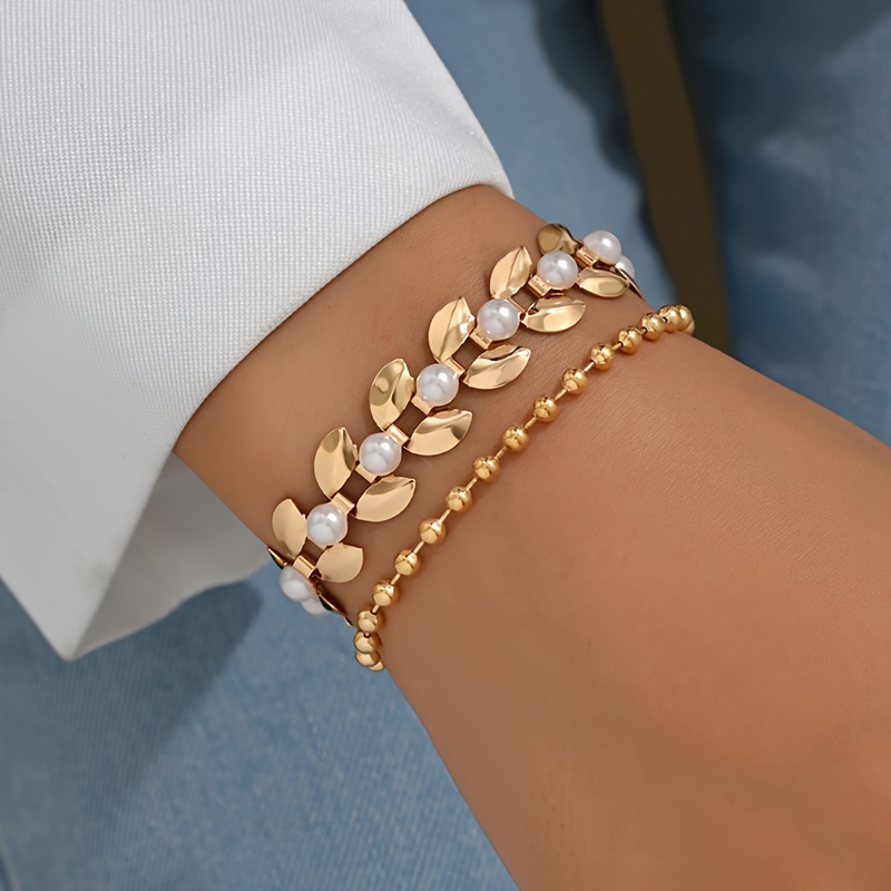 2pc Golden Fashion Bracelet pour Femme en Forme de Blé avec d'Élégantes Fausses Perles, Ensemble de Bracelets Ajustables de Style Vintage
2pc Golden Fashion Bracelet pour Femme en Forme de Blé avec d'Élégantes Fausses Perles, Ensemble de Bracelets Ajustables de Style Vintage