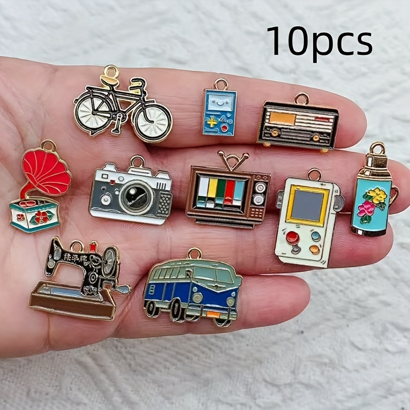 10pcs Collection: Camera, , Bicycle & More - Enamel Alloy Pendants For Making, Necklaces, Bracelets & Accessories, Charms For Jewelry Making
10pcs Collection: Camera, , Bicycle & More - Enamel Alloy Pendants For Making, Necklaces, Bracelets & Accessories, Charms For Jewelry Making