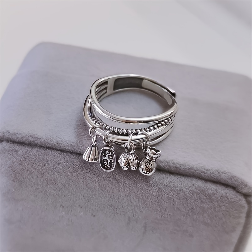 A Ring For Women With , Elegant Style Featuring Coin, Lotus, And Tassel Pendants, Suitable For And Gifting , A Accessory For All .
A Ring For Women With , Elegant Style Featuring Coin, Lotus, And Tassel Pendants, Suitable For And Gifting , A Accessory For All .