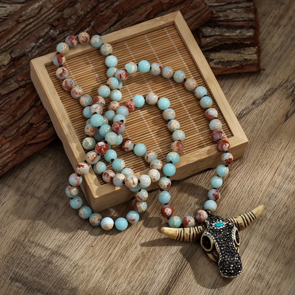 Spring Summer New Fashion Bohemian Tribal Jewelry 8mm Beige Black Imperial Stone Knot Necklace Rhinestone Ox Head Pendant Necklace Personality Colored Beaded Chain Jewelry Decoration
Spring Summer New Fashion Bohemian Tribal Jewelry 8mm Beige Black Imperial Stone Knot Necklace Rhinestone Ox Head Pendant Necklace Personality Colored Beaded Chain Jewelry Decoration