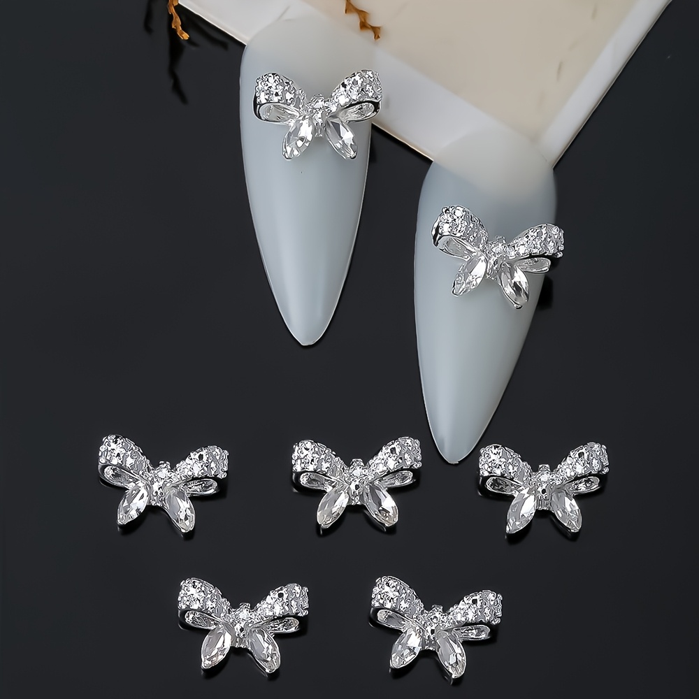 10pcs 3D nœud bijoux à ongles, or et argent diamant, cristal , manucure nail art fournitures pour , , de cristal brillant adapté pour la décoration des ongles , non parfumé
10pcs 3D nœud bijoux à ongles, or et argent diamant, cristal , manucure nail art fournitures pour , , de cristal brillant adapté pour la décoration des ongles , non parfumé