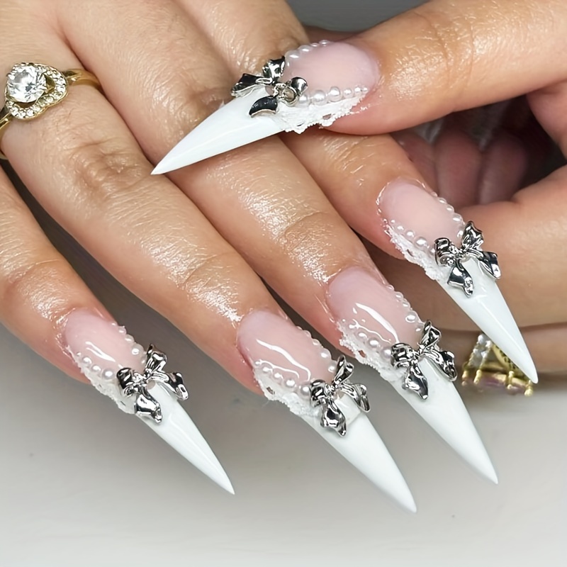 20pcs Per Bag Of Silvery Decorations With Ribbon Style, Metal Butterflies For Nail Art Accessories.
20pcs Per Bag Of Silvery Decorations With Ribbon Style, Metal Butterflies For Nail Art Accessories.