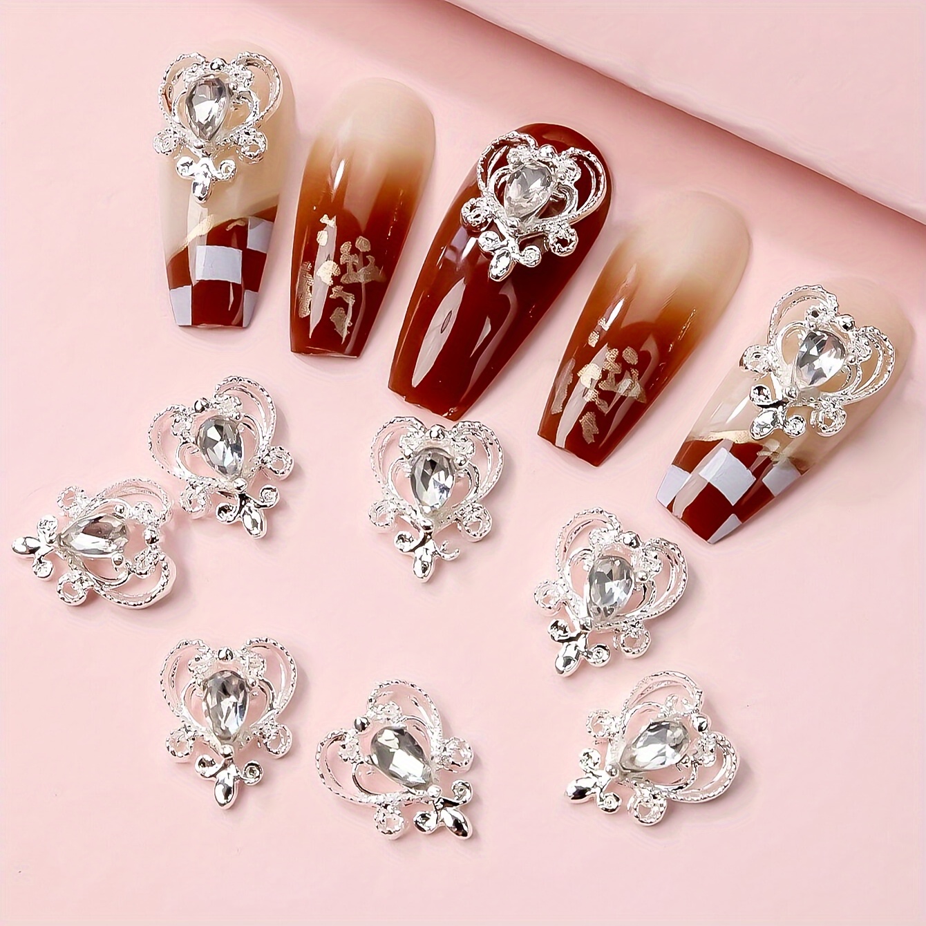 10 pièces de charmes de nail art en couronne et cœur en strass creux en argent, embellissements en pour DIY manucure, pierres à ongles parfum et fournitures
10 pièces de charmes de nail art en couronne et cœur en strass creux en argent, embellissements en pour DIY manucure, pierres à ongles parfum et fournitures