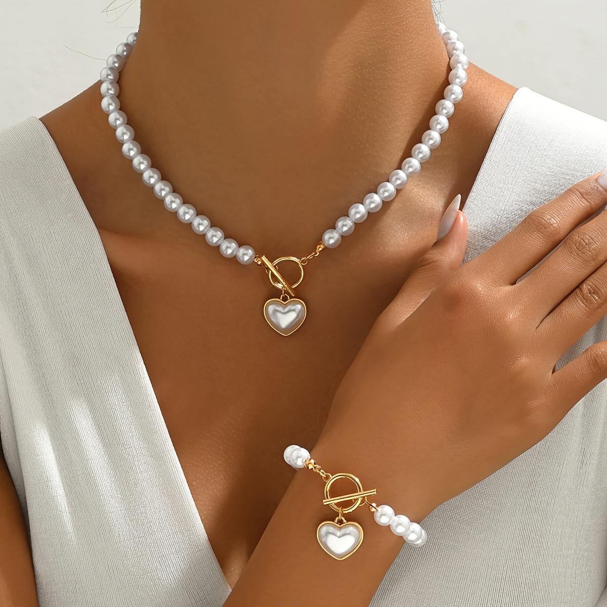 Collier + Bracelet Ensemble de tendance OT Boucle + Coeur + Design de perles artificielles aux tenues quotidiennes Accessoires de fête
Collier + Bracelet Ensemble de tendance OT Boucle + Coeur + Design de perles artificielles aux tenues quotidiennes Accessoires de fête