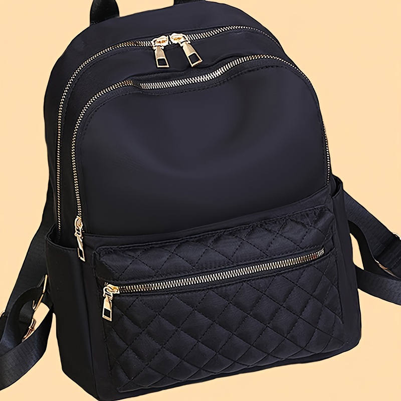 Sac à dos de mode décontracté pour femmes - Style lycée et collège noir en nylon avec sangles ajustables, ornements en de et poches multiples - Fermeture éclair en coque rigide non douce sac à livres
Sac à dos de mode décontracté pour femmes - Style lycée et collège noir en nylon avec sangles ajustables, ornements en de et poches multiples - Fermeture éclair en coque rigide non douce sac à livres