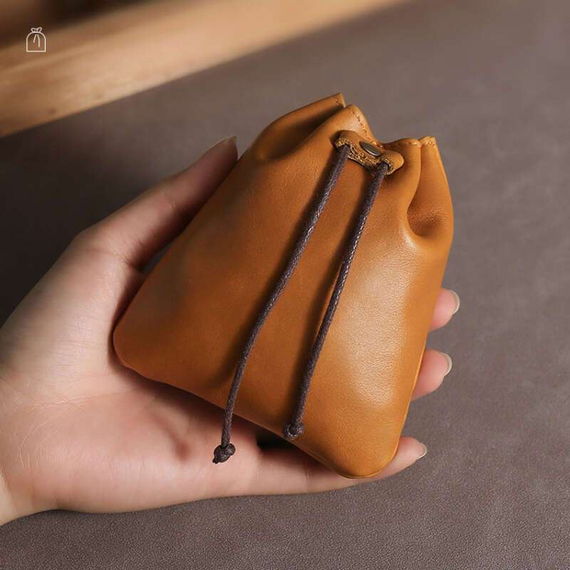 Mini Vintage Drawstring Bag, Genuine Leather Storage Bag, Retro Portable Coin Purse & Wallet
Mini Vintage Drawstring Bag, Genuine Leather Storage Bag, Retro Portable Coin Purse & Wallet