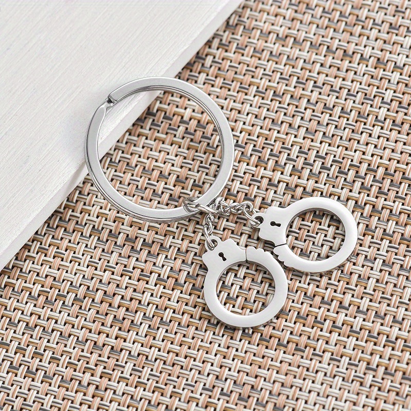 Creative Gift Idea: A Unique Handcuff Keychain For Your Car Keys Or As A Stylish Accessory.
Creative Gift Idea: A Unique Handcuff Keychain For Your Car Keys Or As A Stylish Accessory.
