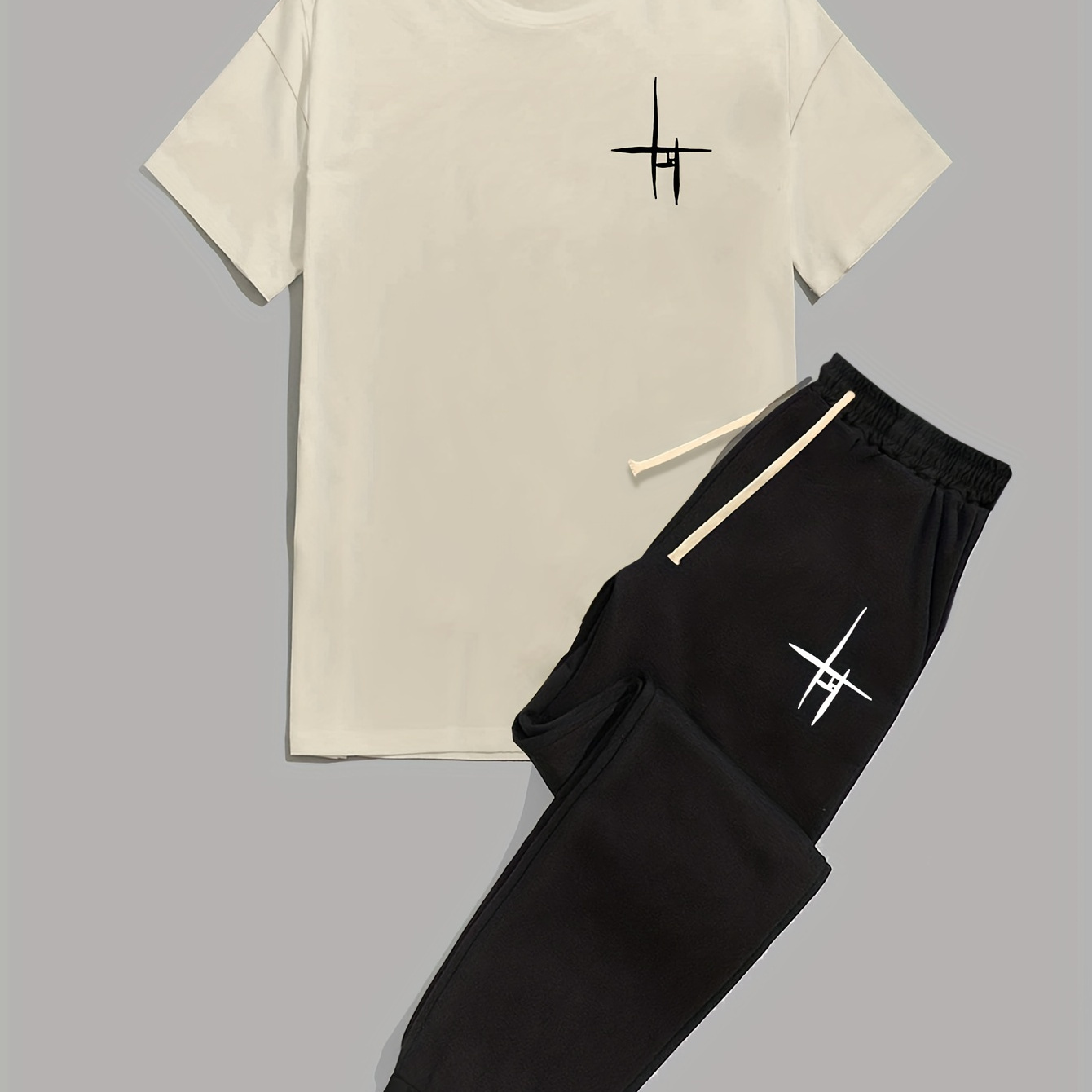 Men's 2 Piece Outfits, Creative Line Pattern Print Casual Short Sleeve Tee And Drawstring Sweatpants Set
Men's 2 Piece Outfits, Creative Line Pattern Print Casual Short Sleeve Tee And Drawstring Sweatpants Set