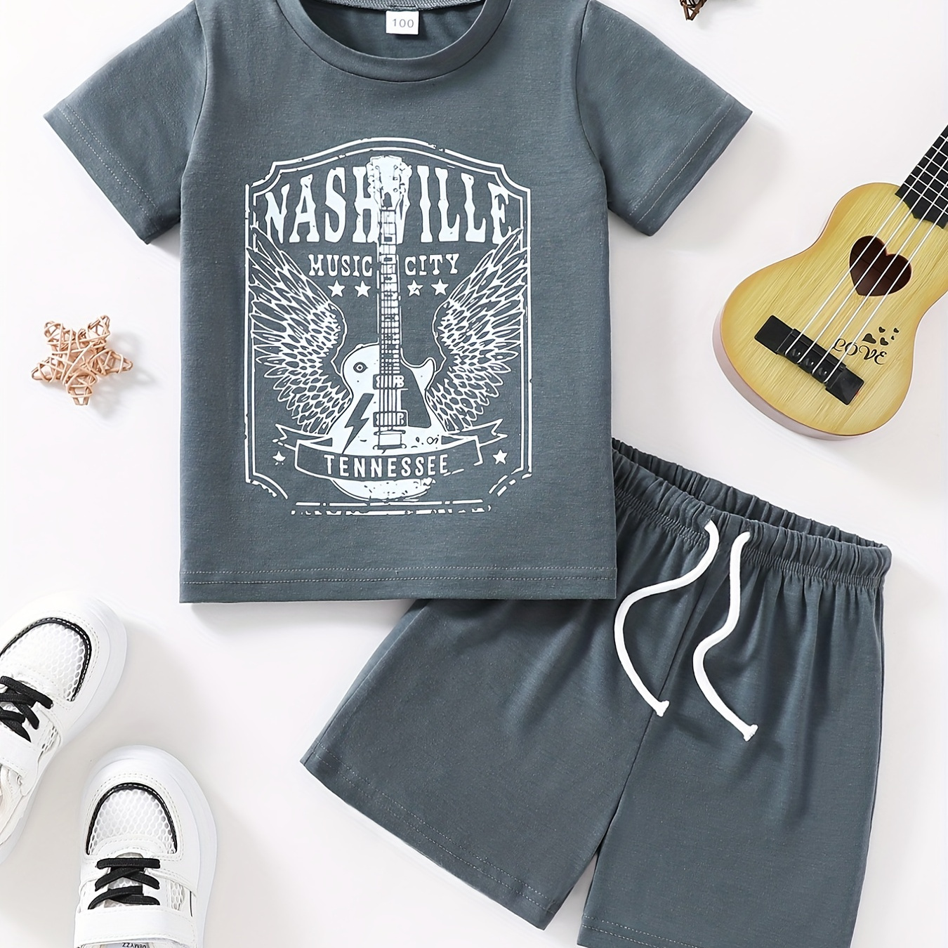 2pcs Boys Casual Stylish Guitar Graphic Print Short Sleeve T-shirt&shorts Set, Comfy Summer Kids Clothing
2pcs Boys Casual Stylish Guitar Graphic Print Short Sleeve T-shirt&shorts Set, Comfy Summer Kids Clothing