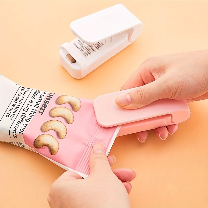 Snack Sealing Machine, Mini Small Household Plastic Sealing Machine, Moisture-proof Fresh-keeping Portable Pumping Vacuum Plastic Bag Sealing Machine
Snack Sealing Machine, Mini Small Household Plastic Sealing Machine, Moisture-proof Fresh-keeping Portable Pumping Vacuum Plastic Bag Sealing Machine