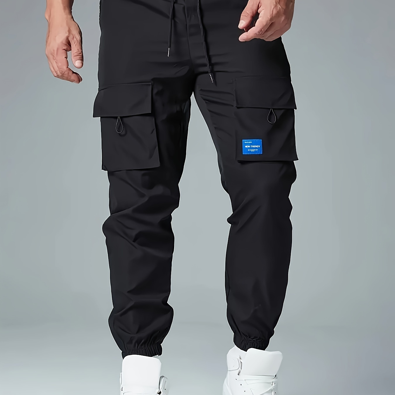 Men's Loose Solid Cargo Joggers With Pockets, Active Breathable Drawstring Trousers For Outdoor
Men's Loose Solid Cargo Joggers With Pockets, Active Breathable Drawstring Trousers For Outdoor