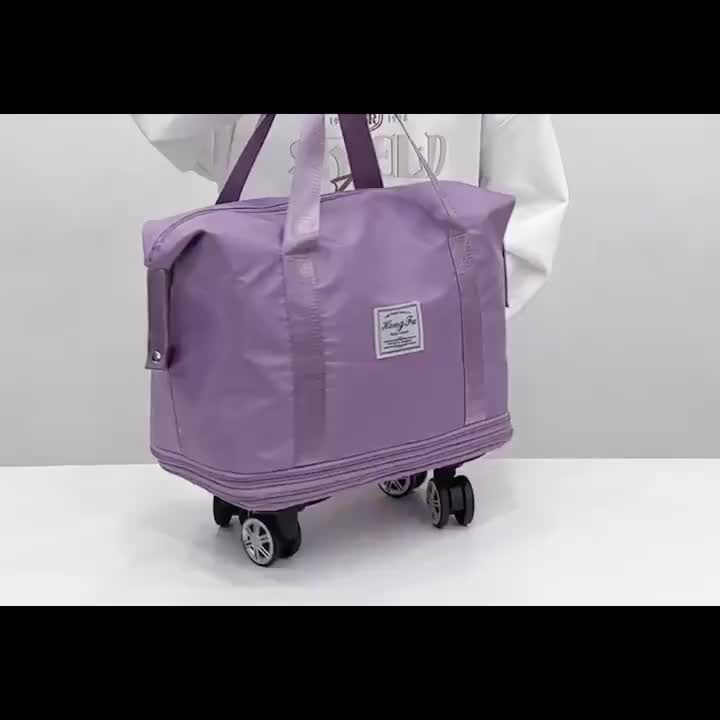Extra Large Expandable Travel Suitcase with Randomly Colored Wheels