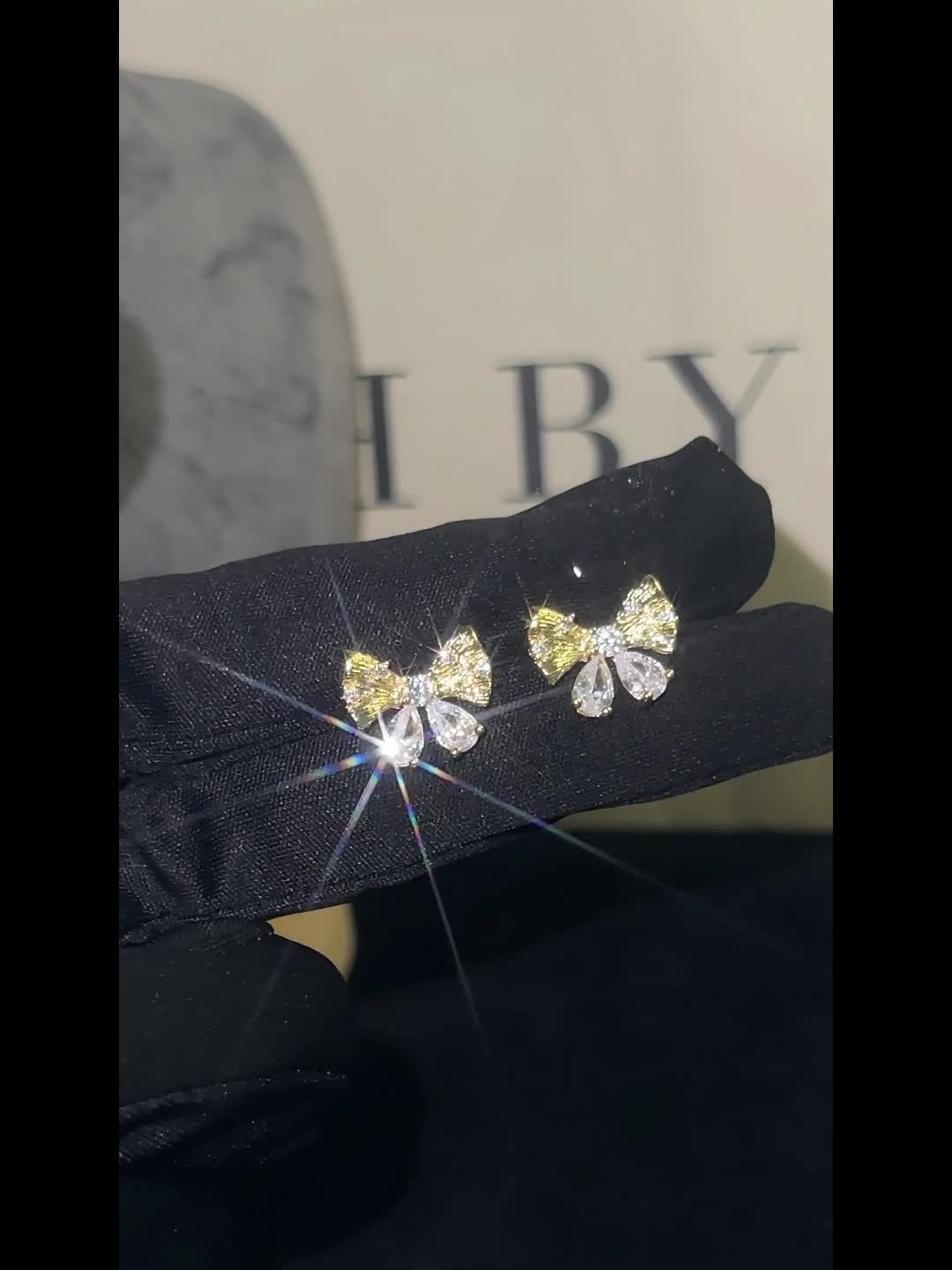 Women's Elegant Faux Bow Stud Earrings with Zirconia Inlay