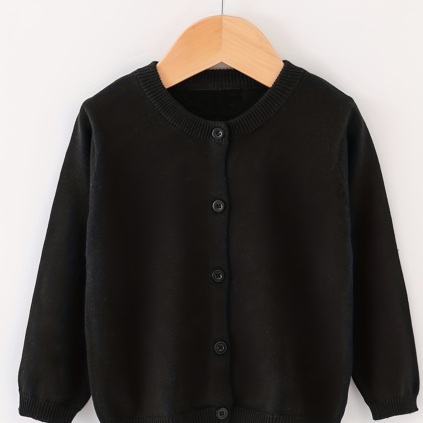 OLLOUM Slimming Button Ultra-Soft Solid Knit Bell Sleeves, Mayfsie Slimming  Button Cardigan Sweater with Pockets, with Brooch (Color : Black, Size :  X-Small) : : Clothing, Shoes & Accessories