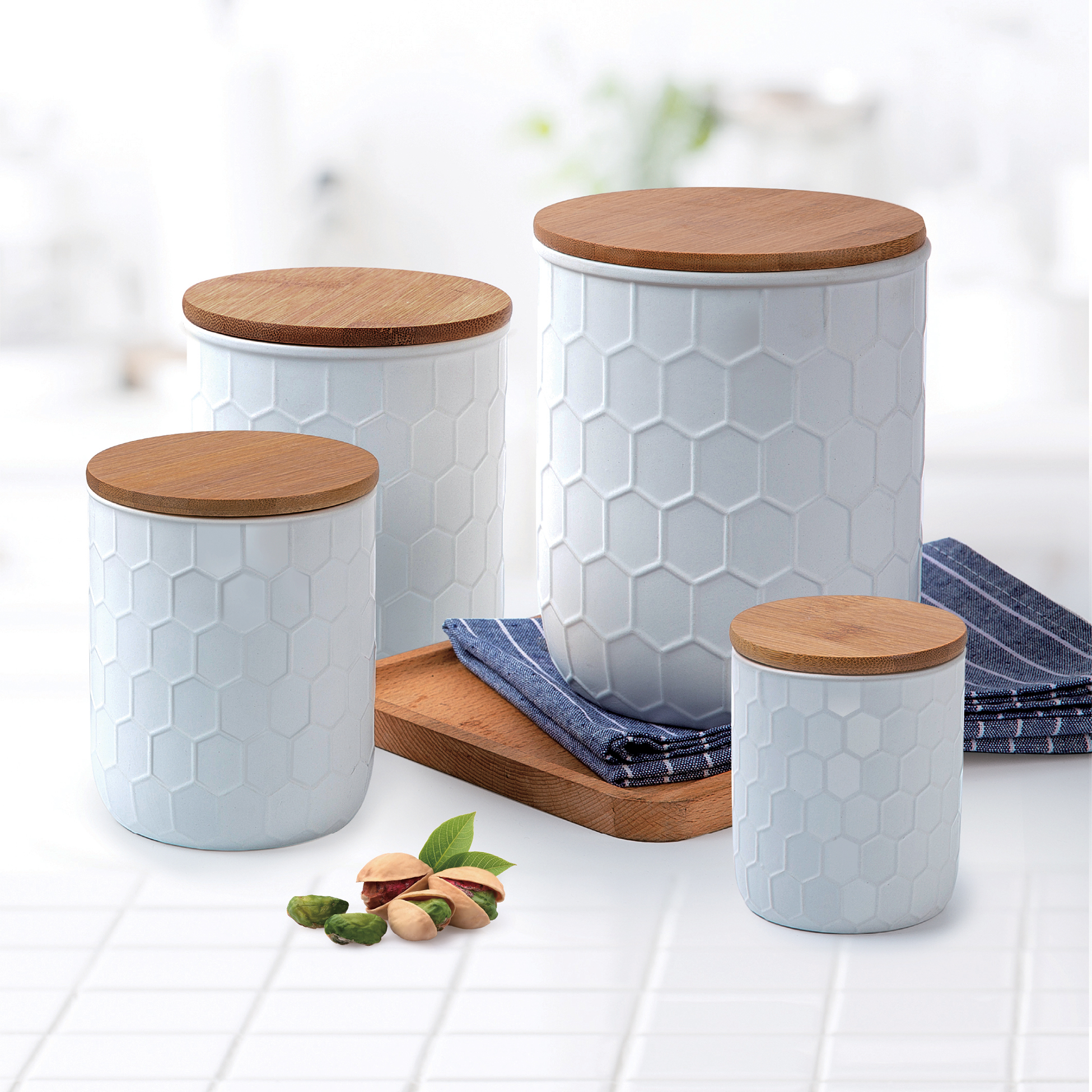 

4 Ceramic Canister Set With Bamboo Lid