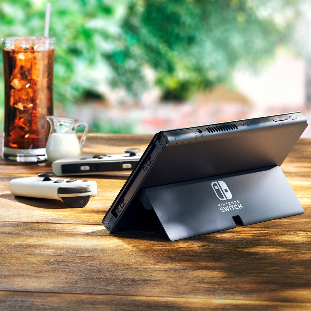 Nintendo Switch OLED Model with White and Black Joy-Con