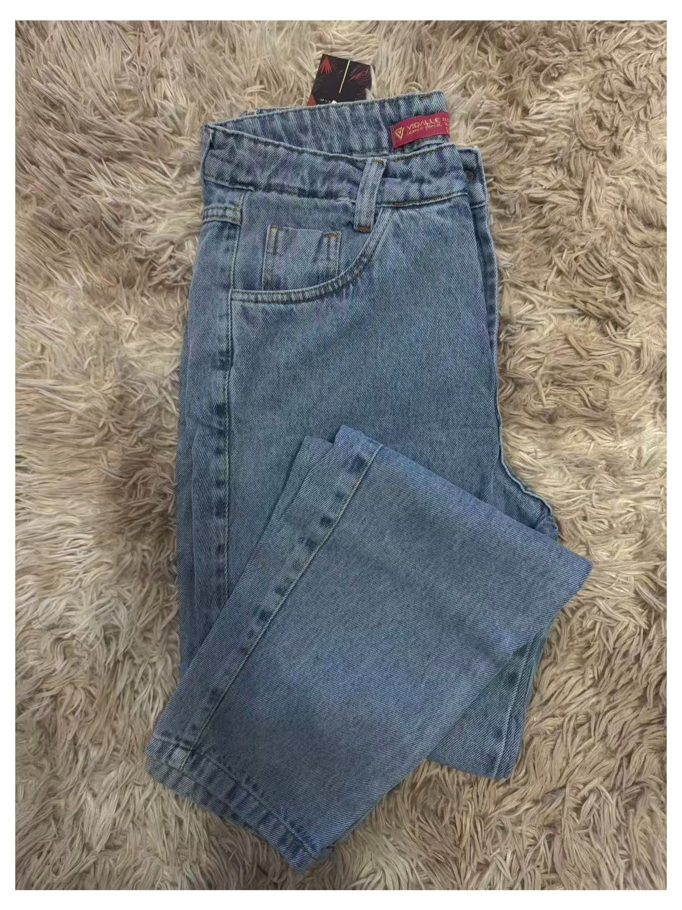 Jeans cintura alta marmorizada na cor azul