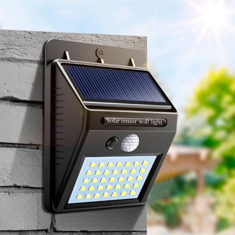 Lâmpada solar LED preta com perlas de luz brancas