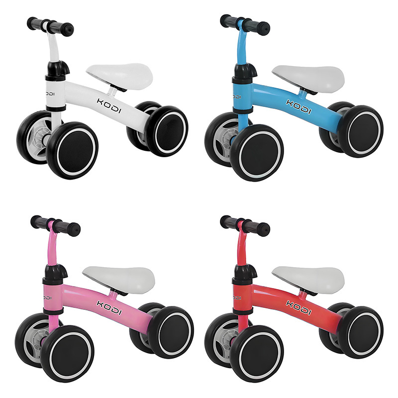 Quatro modelos da bicicleta de equilíbrio Kodi exibidos nas cores branca, azul, rosa e vermelha.