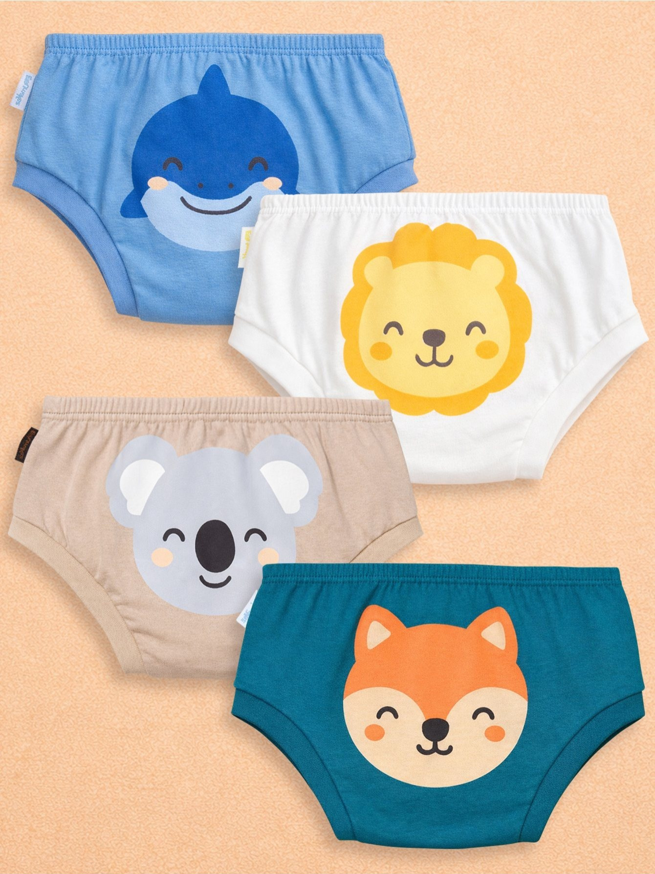 Kit com 4 cuecas tapa fralda infantis com estampas de animais: tubarão, leão, koala e raposa, dispostas de forma organizada.