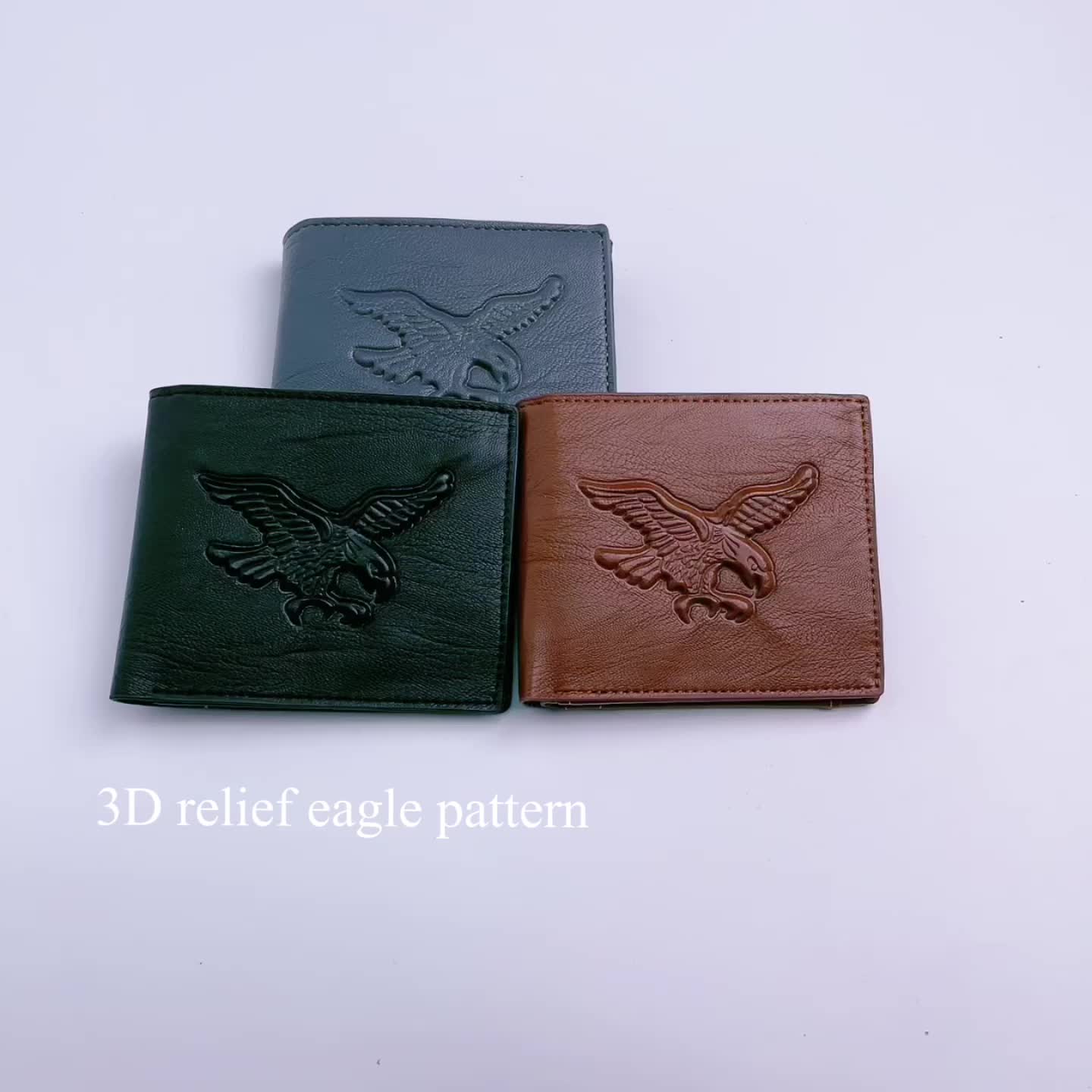 Leather coin-pocket wallet with all-over embossed eagle