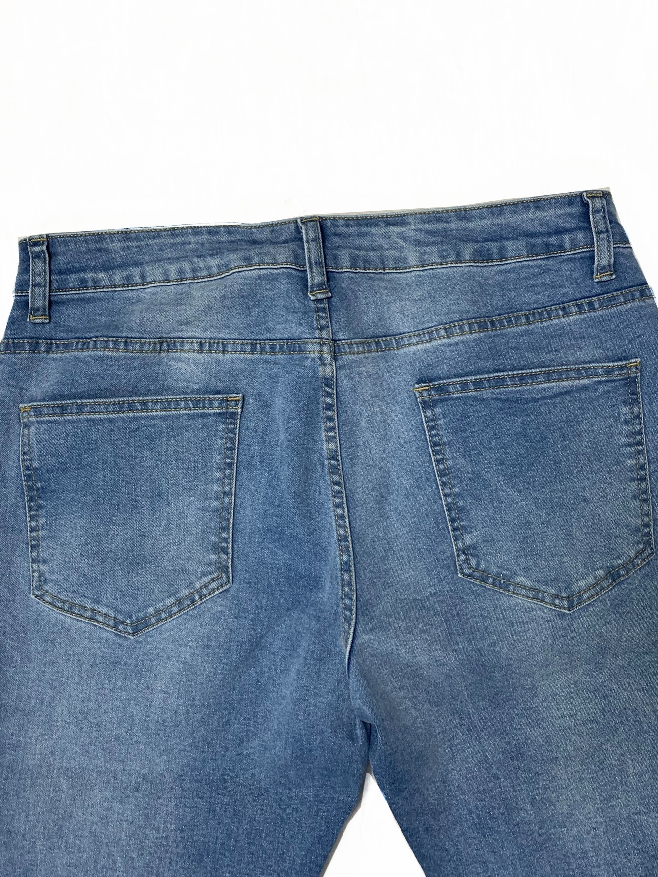 Jeans carrot strappati on sale uomo