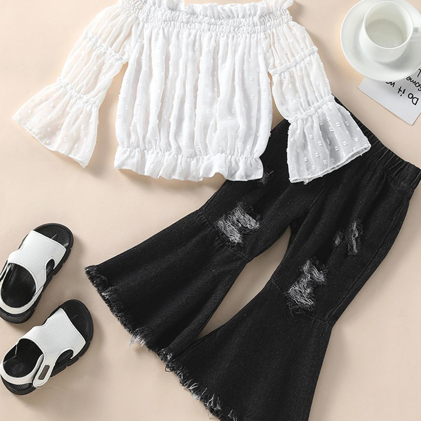 

2pcs Girls Chiffon Off The Shoulder Long Sleeve Top & Ripped Flared Jeans Set