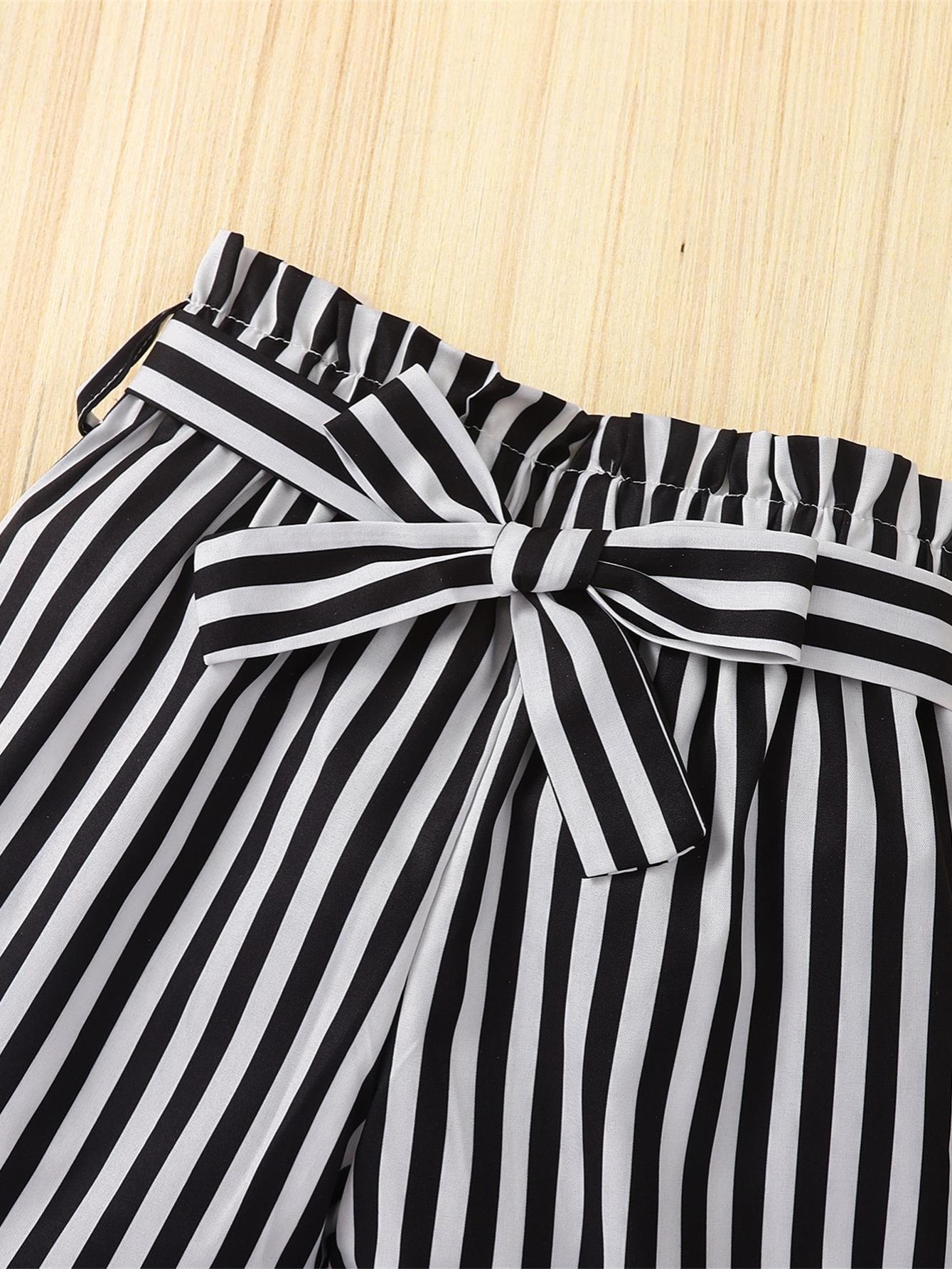 Conjunto de 2 piezas de camiseta de manga larga para niñas, rayas negras y  blancas, cuello redondo, tops y pantalones de pierna ancha con cintura elás