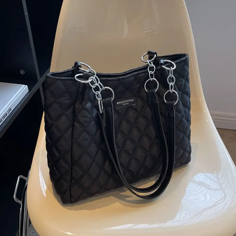 chanel black quilted tote handbag