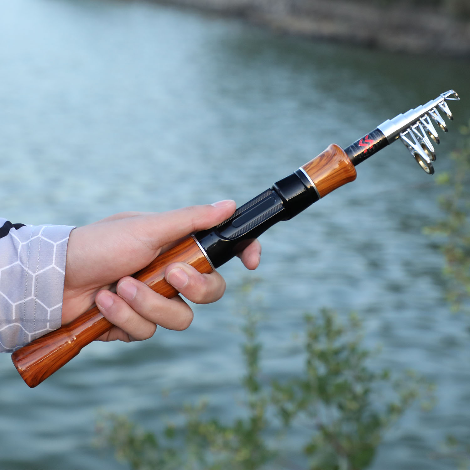 SOUGAYILANG Telescopic Fishing Rod - Lightweight, Portable, And Durable  Cork Handle Travel Fishing Rod