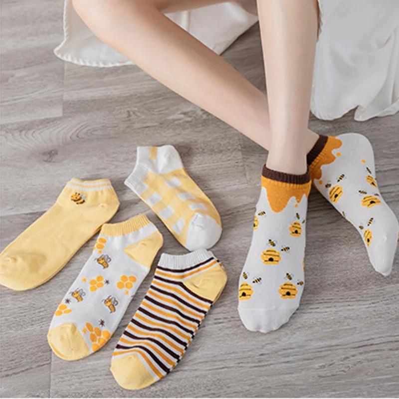 Calcetines amarillos con diseño de abejas de Accessorize