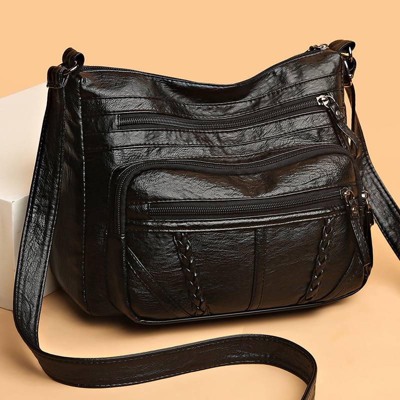 leather multi pocket cross body handbag