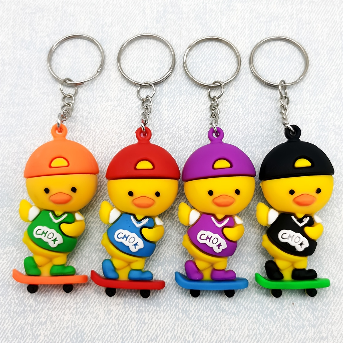 

4pcs/set Skateboard Duck Keychain Pvc Cute Cartoon Animal Bag Key Chain Keyring Ornament Bag Purse Charm Accessories