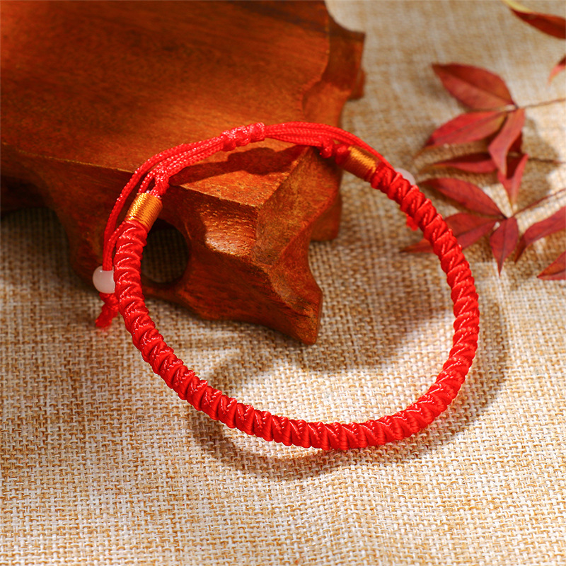 Red bracelet hot sale lucky charm