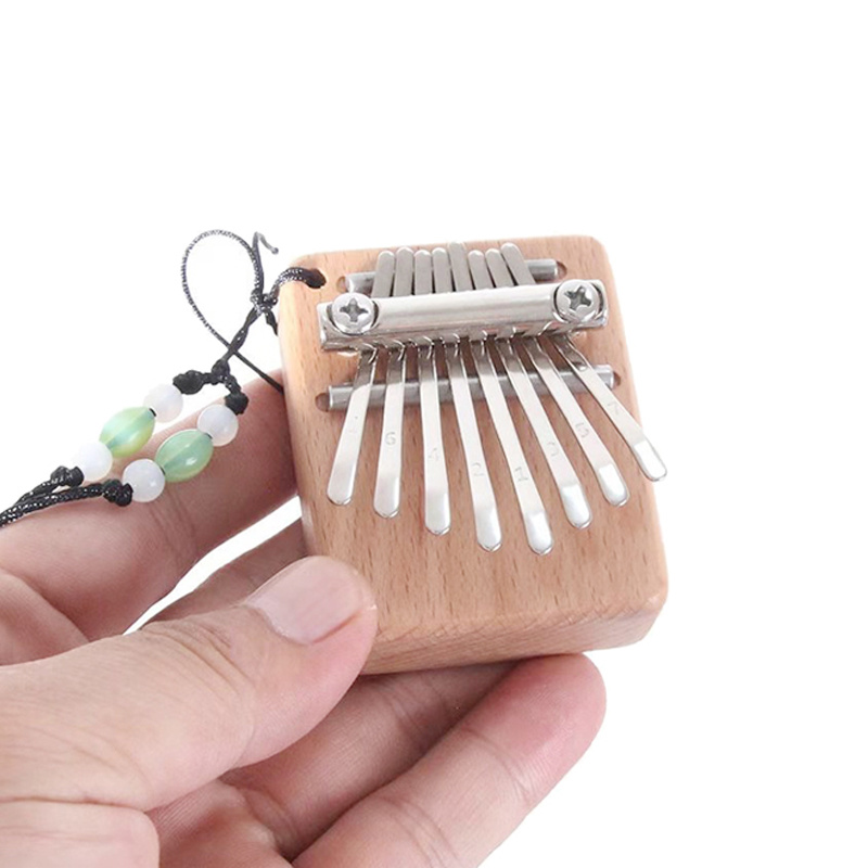 Bakodiu Kalimba Finger Pianoforte Gadget con cordino portatile Pollice  Pianoforte per Adulti Bambini Principianti - Marimbas Strumento Musicale  Suoni Meravigliosi Musica Professionale Ciondolo Regalo : :  Strumenti Musicali